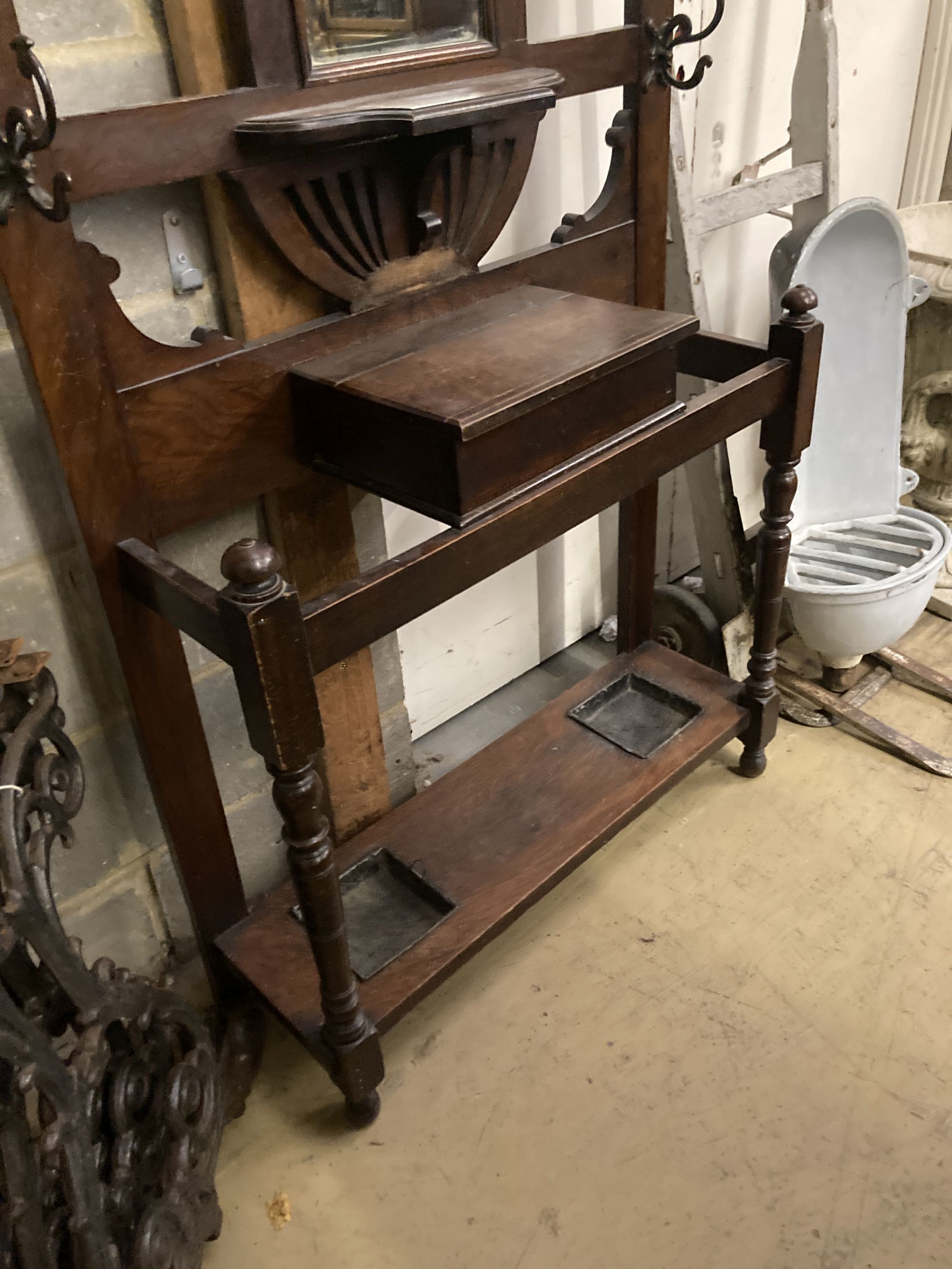 A late Victorian mahogany hallstand, width 93cm, depth 29cm, height 210cm